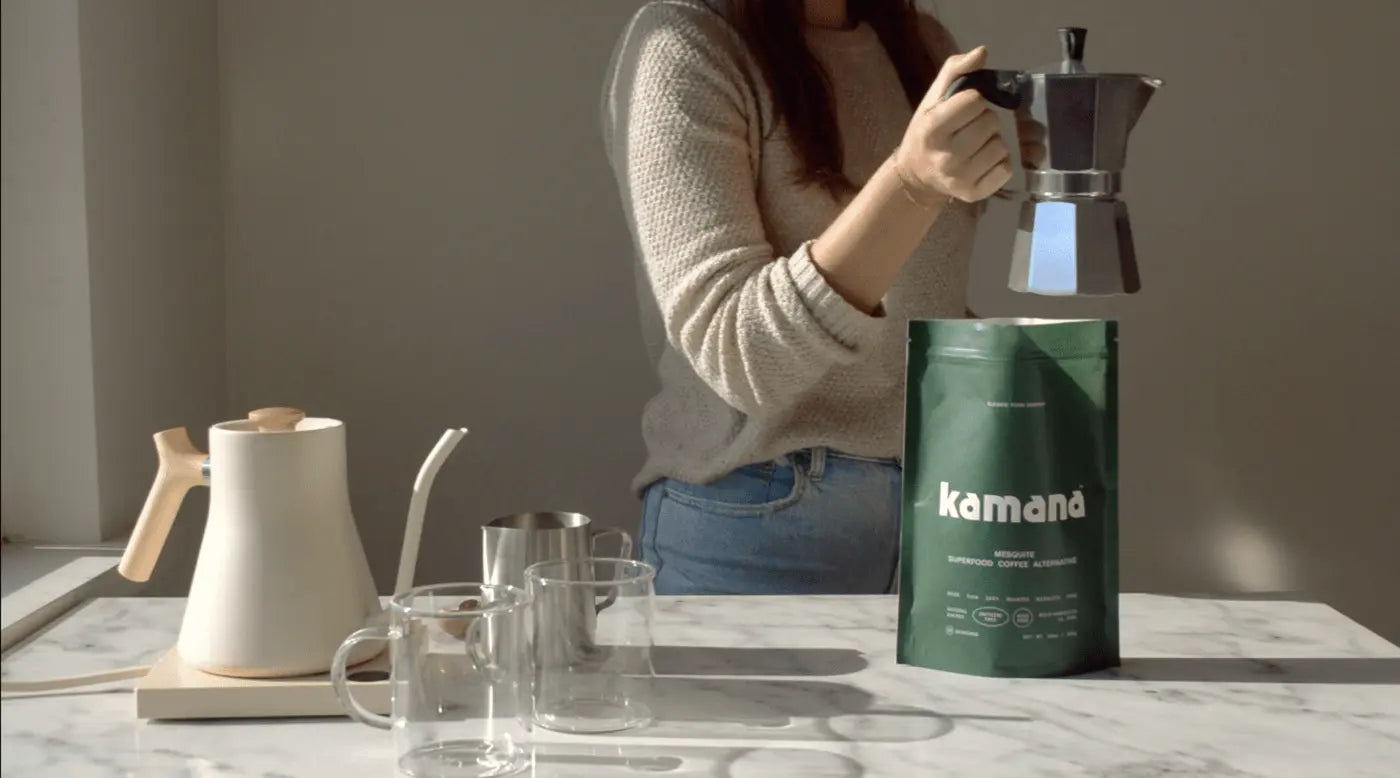 Woman holding a moka pot alongside Kamana mesquite coffee alternative, a natural coffee replacement for energy